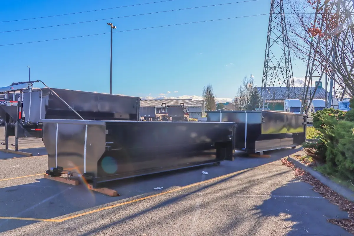Roll-off dumpster ready for waste disposal at job site for Demolition Dumpster Rental in South Venice